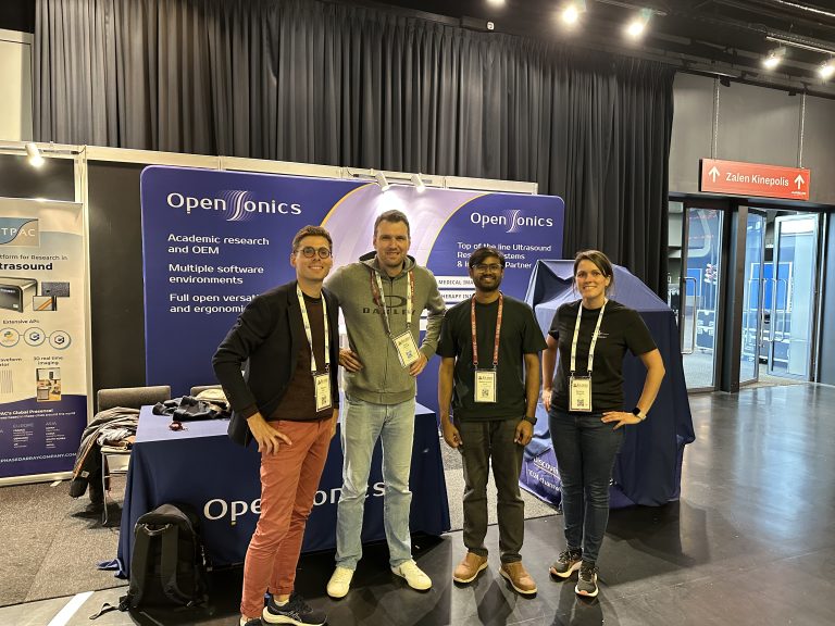 OpenSonics team and booth at previous IEEE IUS ultrasound conference in Utrecht